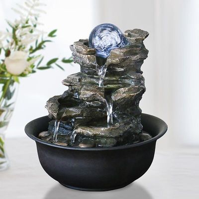 Montaña de la roca interior con la fuente de agua de la sala de estar de la decoración de interiores del hogar de Polyresin de la bola de cristal con el LED proveedor